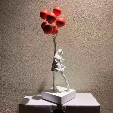 Banksy's Flying Balloon Girl Sculpture