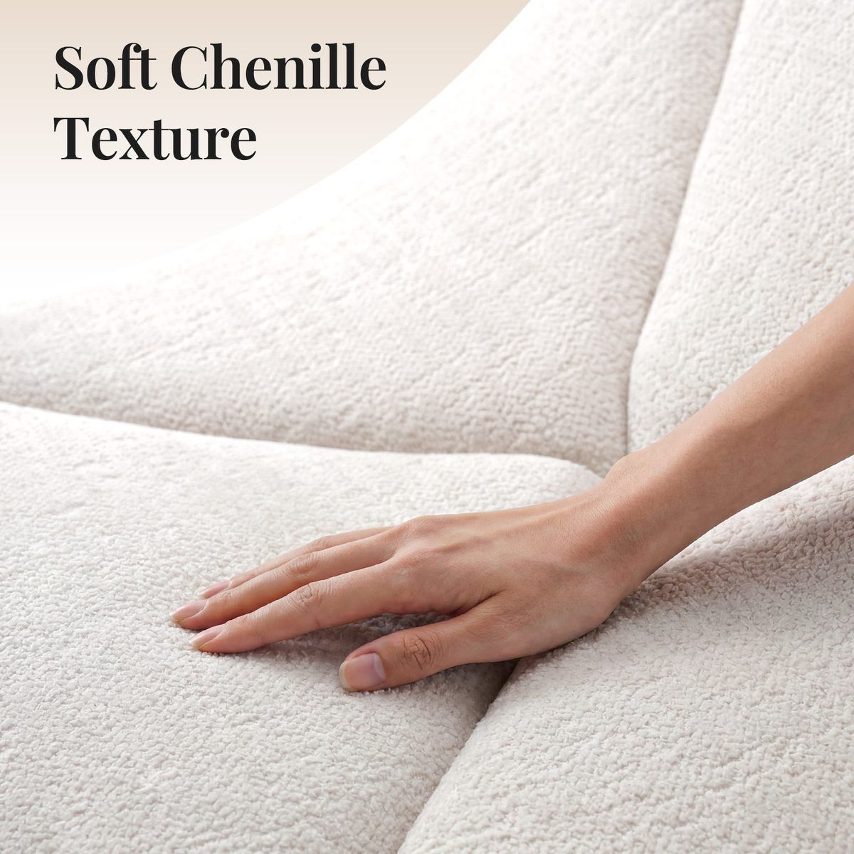 Close-up of white Dune sofa's chenille fabric and seam detail with a hand touching it