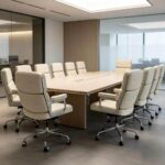Ivory White Eames Executive Office Chairs arranged around a long wooden conference table.