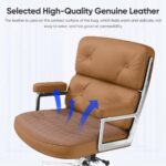 Close-up of the Light Brown Eames Executive Office Chair's tufted leather upholstery, with arrows illustrating airflow.