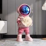 Life-Size Astronaut Holding Moon Statue