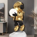Life-Size Floating Astronaut Holding Moon Statue