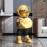 Life-Size Astronaut Holding Moon Statue