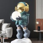 Life-Size Floating Astronaut Holding Moon Statue