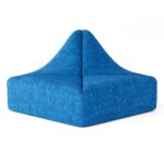 Blue Dune sofa armless module, angled view showing peaked twin-panel back seam