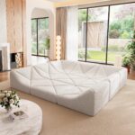 White Dune modular sofa square-pit sectional in a sunlit living room near a fireplace